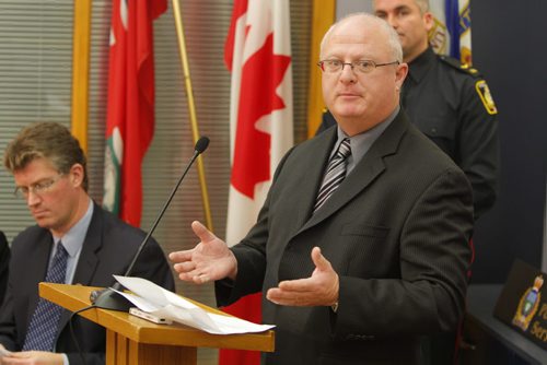 Winnipeg Police Service Detective Sgt. John O'Donovan addresses the media regarding the Manitoba Integrated warrant unit. December 12, 2011 BORIS MINKEVICH / WINNIPEG FREE PRESS