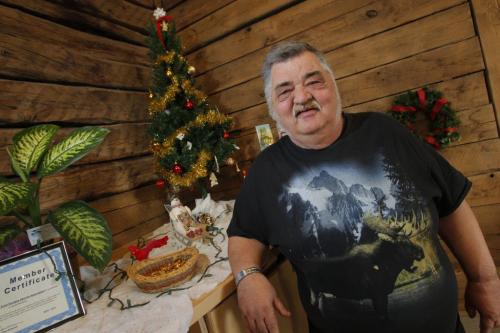 Wayne King with Christmas tree and decorations he donated to Barber House. Wayne is a big scary guy who is living on the edge ¤ he is also kind-hearted and donated the Christmas tree he inherited from his mom to Barber House. For Sharing Christmas Spirit thing.December 15, 2011 BORIS MINKEVICH / WINNIPEG FREE PRESS