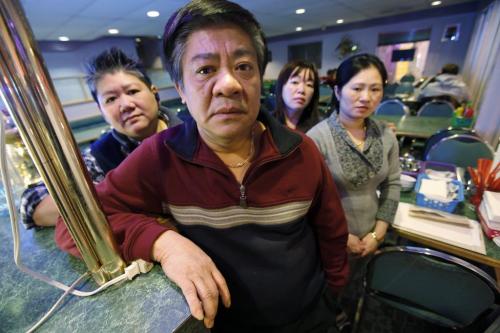 December 13, 2011 - 111216  -  Bac Bui, owner of the Vi-Ann restaurant, is photographed with his staff (L to R) Leslie Tu, Trink Diep, and Thao Dang, Tuesday, December 13, 2011. The neighbouring Shoppers Drug Mart has purchased the building he rents without his knowledge with plans to expand the store. John Woods / Winnipeg Free Press
