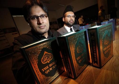 December 18, 2011 - 111218  -  Dr. Afzal Muhammad (L), president of Ahmadiyya Muslim Jamaat, and Hammad Ahmad, a missionary with Ahmadiyya Muslim Jamaat, pose for a photograph at a Qur'an seminar at the Millennium Library Sunday, December 18, 2011.    John Woods / Winnipeg Free Press