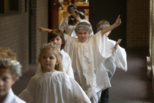 Children from kindergarten in their angel outfits line up to enter concert at St. John Brebeuf  They sang Heavenly Hallelujahs during their production of Miracle at Midnight  - See Lindor Reynolds Christmas story December 20, 2011   (JOE BRYKSA / WINNIPEG FREE PRESS)