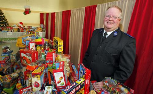 Salivation Army Toy Center. Ministry Director with the Salvation Army Weetamah Corps Mark Young poses for photo at the Toy Center on Logan.  December 21, 2011 BORIS MINKEVICH / WINNIPEG FREE PRESS