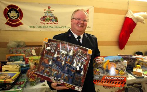 Salivation Army Toy Center. Ministry Director with the Salvation Army Weetamah Corps Mark Young poses for photo at the Toy Center on Logan.  December 21, 2011 BORIS MINKEVICH / WINNIPEG FREE PRESS