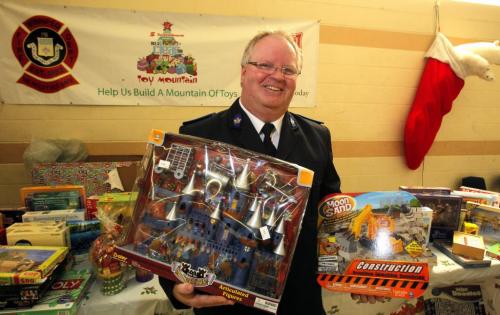 Salivation Army Toy Center. Ministry Director with the Salvation Army Weetamah Corps Mark Young poses for photo at the Toy Center on Logan. December 21, 2011 BORIS MINKEVICH / WINNIPEG FREE PRESS