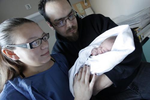 December 30, 2011 - 111230  -  Kyle Genaille, 25, fiancé Andrea Thomas, 24, and son Tristan, less than one day old (born 6:25 a.m. this morning) are photographed at St. Boniface Hospital  in Winnipeg Friday, December 30, 2011.  Kyle helped deliver the baby in the car on the way to the hospital.  John Woods / Winnipeg Free Press