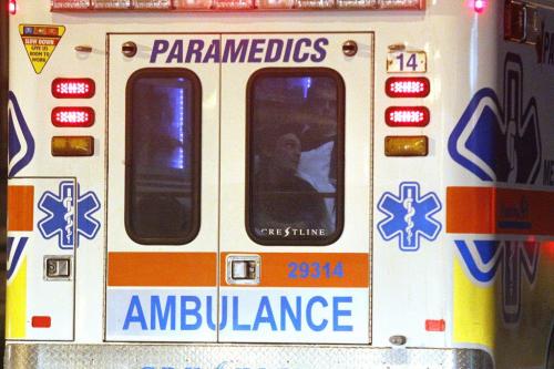 December 30, 2011 - 111230  -  A victim of a shooting talks to paramedics in an ambulance outside Colony Square on St. Mary Avenue Friday, December 30, 2011.   John Woods / Winnipeg Free Press
