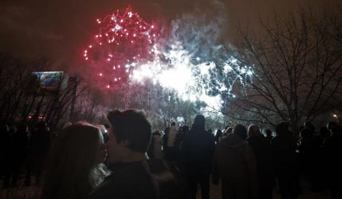 Daria Sywak (left) and Matt Cassie (right) kiss during the New Years Eve fireworks display at The Forks celebrating the new year, 2012. 111231 - Saturday, December 31, 2011 -  (MIKE DEAL / WINNIPEG FREE PRESS)