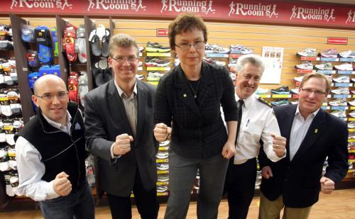 Winnipeg Police Service 8th Annual Cops for Cancer Half Marathon presser at the Running Room, 1875 Grant Avenue.  left to right - Race Director, Constable Nick Paulet , Minister of Justice and Attorney General, Andrew Swan, Linda Howes, Volunteer Director of the Board, Canadian Cancer Society, Winnipeg Police Chief Keith McCaskill, and City Councillor, Scott Fielding on behalf of Mayor Sam Katz pose for a photo at the presser. January 6, 2012 BORIS MINKEVICH / WINNIPEG FREE PRESS