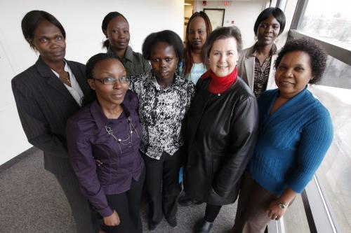 January 08, 2012 - 120108  -  Marilou McPhedran (Front row, 2nd from Right), Dean of the University of Winnipeg Global College is photographed with some of  "Daughters of Sudan" (LtoR) Elizabeth Aluk Andrea, Mercy Yel, Sandy Deng, Rebecca Atet Deng, Arek Manyang, Veronica Abraham, and Andria Kaka, at the University of Winnipeg Sunday, January 08, 2012.    John Woods / Winnipeg Free Press
