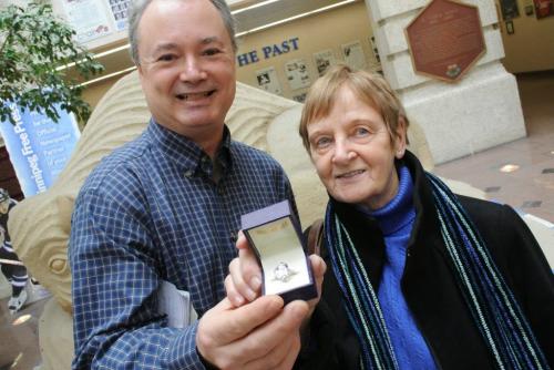 Retha Brinkman, from Kenora, with Kevin Rollason and the ring from Ben Moss that Retha won in the Pennies from Heaven charity draw.  120110 Mike Deal / Winnipeg Free Press