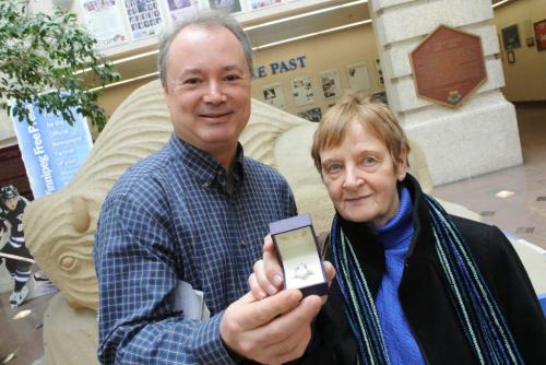 Retha Brinkman, from Kenora, with Kevin Rollason and the ring from Ben Moss that Retha won in the Pennies from Heaven charity draw.  120110 Mike Deal / Winnipeg Free Press