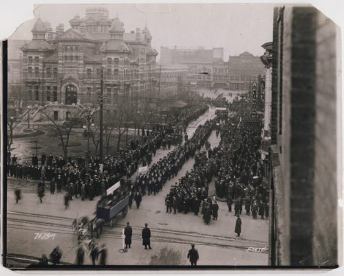 Winnipeg Free Press Archives L. B. Foote Neg# 7175-4 City Hall, April 4, 1921 NOTE: In the paper on Monday, April 4, 1921, a story on page 15 with the headline: Unemployed March In Parade Through City  Union Jack At Head and Socialist Red Flag Midway Approximately four hundred took part in the unemployed parade through the Winnipeg streets on Saturday afternoon. The parade where a mass meeting had been held earlier in the afternoon, it being addressed by several of the Winnipeg labor leaders. fparchive