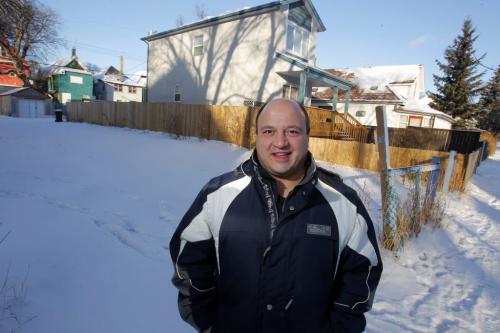 Frank Zappia of Zappia Group Realty poses for a photo near a property of interest on McGee . January 12, 2012 BORIS MINKEVICH / WINNIPEG FREE PRESS