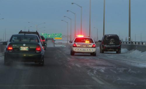 Traffic stacks up on the north perimeter highway westbound as a MVC on top of the bridge gets cleaned up.  January 13, 2012 BORIS MINKEVICH / WINNIPEG FREE PRESS