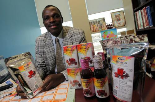 YOMM Beverages Inc. vice President/CEO Meshack Kusa poses for a photo. AFRICA PAPER.  January 13, 2012 BORIS MINKEVICH / WINNIPEG FREE PRESS