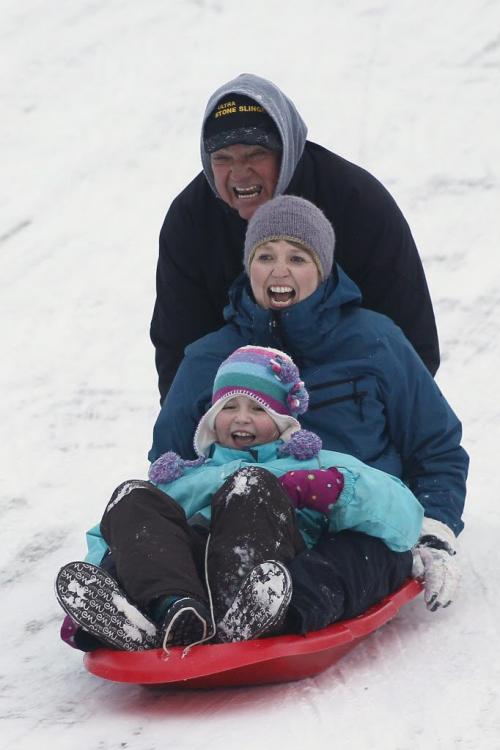 January 15, 2012 - 120115  -  John Spoelstra, who was in from Niagara visiting his eight year grand-daughter Katrina Strempler and her mother, goes sledding at Assiniboine Park Sunday January 15, 2012.    John Woods / Winnipeg Free Press