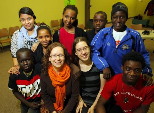 A small group of African students go to school at Calvary Temple. The teachers are Francine Wiebe and Jessica McInnes (middle front). Around them Chol Majur, Jussy Velasco, Saliem Beraki, Mesrak Samsom, Thomas Abut, Shedrek Samuel, and Mo Geddert.  January 12, 2012 BORIS MINKEVICH / WINNIPEG FREE PRESS