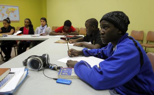 Shedrek Samuel, right in blue, in class at Calvary Temple.  January 12, 2012 BORIS MINKEVICH / WINNIPEG FREE PRESS