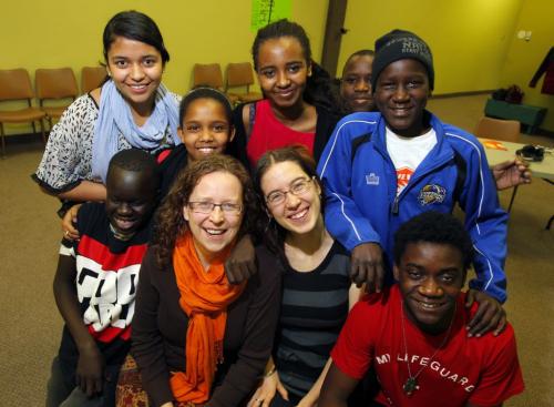 A small group of African students go to school at Calvary Temple. The teachers are Francine Wiebe and Jessica McInnes (middle front). Around them Chol Majur, Jussy Velasco, Saliem Beraki, Mesrak Samsom, Thomas Abut, Shedrek Samuel, and Mo Geddert.  January 12, 2012 BORIS MINKEVICH / WINNIPEG FREE PRESS