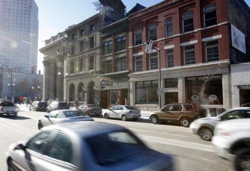 The pace of development  story regarding the Exchange District - 460 block of Main st.  including Parlour Coffee 468 Main St. SUDAY EXTRA - DAVE CONNORS , BART KIVES ROBERT GALSTON  - KEN GIGLIOTTI /  WINNIPEG FREE PRESS /  Jan. 20 2012