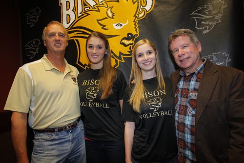 Garth Pischke with his daughter Taylor Pischke and Caleigh Dobie with her dad Brian Dobie, pose for a photo at the University of Manitoba press conference Womens Volleyball. January 24, 2012 BORIS MINKEVICH / WINNIPEG FREE PRESS