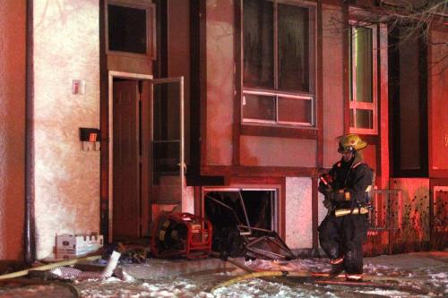 January 24, 2012 - 120124  - Firefighters were called to a fire at 11 Woodlark Place Tuesday January 24, 2012. Two adults and three children were taken to hospital in critical condition.   John Woods / Winnipeg Free Press
