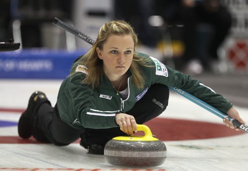 Skip Chelsea Carey throws during play Thursday afternoon against team Kim Link, not pictured, at the 2012 Scotties Tournament of Hearts in Portage La Prairie, Manitoba- - See Paul Wiecek story January 26, 2012   (JOE BRYKSA / WINNIPEG FREE PRESS)