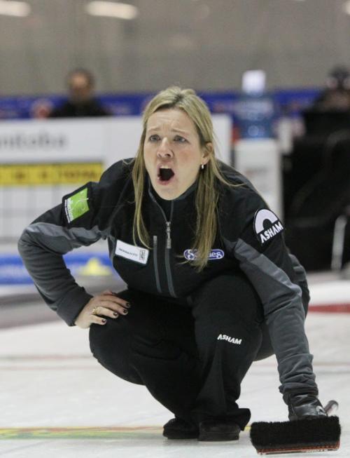 Skip Cathy Overton-Clapham shouts after throwing a rock during the Friday afternoon draw against Team Carey in the Scotties Tournament of Hearts at the Portage la Prairie PCU Centre. 120127 Mike Deal / Winnipeg Free Press