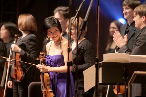Violin soloist Jennifer Koh is all smiles at the end o the second  at the opening gala for the 21st annual New Music Festival at the Concert Hall Saturday evening.  Jan 28, 2012 (Ruth Bonneville / Photographer) Winnipeg Free Press
