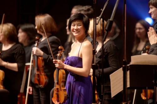 Violin soloist Jennifer Koh is all smiles at the end o the second  at the opening gala for the 21st annual New Music Festival at the Concert Hall Saturday evening.  Jan 28, 2012 (Ruth Bonneville / Photographer) Winnipeg Free Press