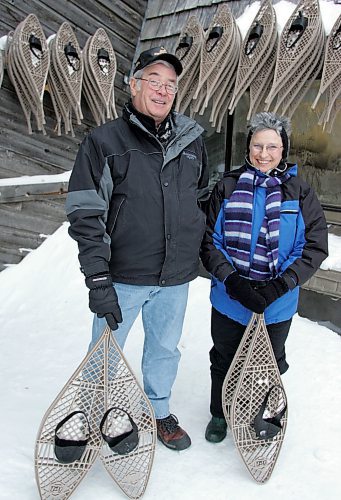 BORIS MINKEVICH / WINNIPEG FREE PRESS  070116 Gord Manby and Jennette Hardy pose for a photo at the snow shoe station at FortWhyte Alive.