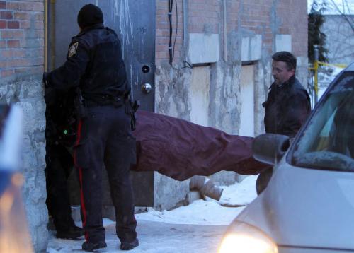 Winnipeg Police Service attended the scene of what is being called, as of 3:30, a sudden death. The address is 426 Maryland. The photo was taken looking at the back side of the building. In the photo is a crew, not cops, that removed the body and put it into a minivan out back. Please refer to Gabrielle Giroday, who was at the scene as well. January 30, 2012 BORIS MINKEVICH / WINNIPEG FREE PRESS