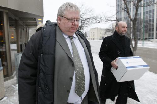 January 30, 2012 - 120130  -   Mark Stobbe (L), who has been charged with killing his wife Beverly Rowbotham in 2000, leaves court with his lawyer Tim Killeen in Winnipeg Monday January 30, 2012. John Woods / Winnipeg Free Press
