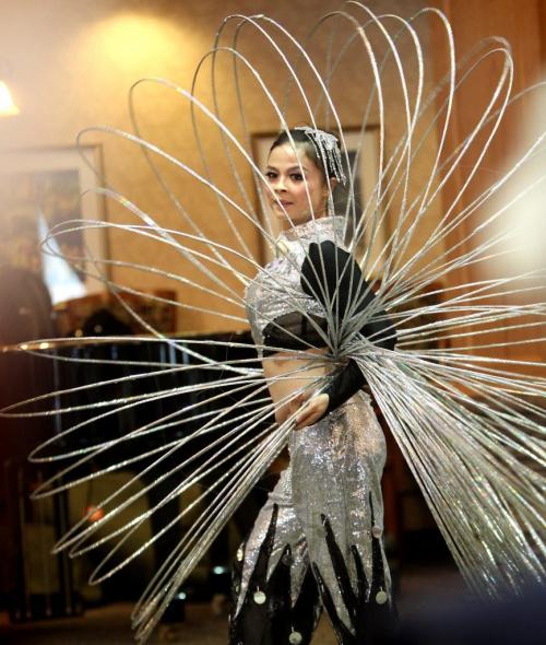 Hula Hoop acrobatic dancer - Shuilian Lu with the Guizhou Acrobat Troupe from southwest China was just one of the many talented dancers that gave a sampling of their show at Shaftesbury Park Retirement Home Tuesday afternoon for Chinese New Year.  The full 2 hour performance can be seen at the Chinese New Year Celebrations at Pantages Playhouse Theatre Saturday evening. Jan 31, 2012 (Ruth Bonneville / Photographer) Winnipeg Free Press