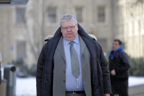 Mark Stobbe, who's accused of beating his wife Beverly to death with a hatchet, out for a break from the trial. Photo taken in front of Law Courts buidling. REPORTER: Bruce Owen.  February 1, 2012 BORIS MINKEVICH / WINNIPEG FREE PRESS