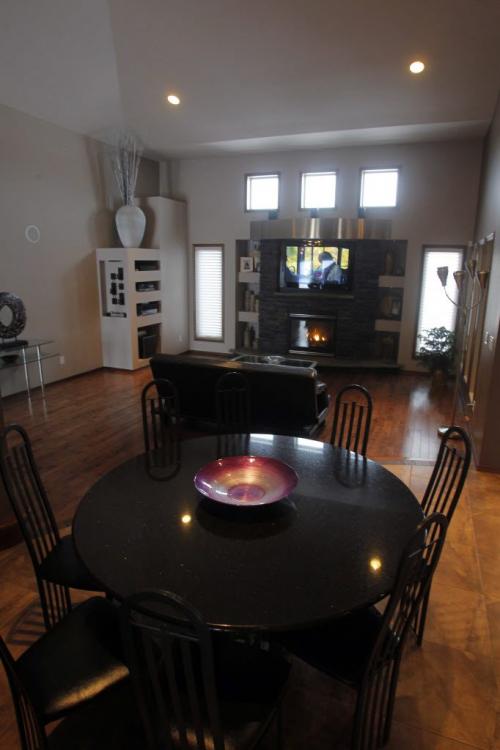 HOMES - 1307 Charleswood Road. Kitchen table that extends into the main livingroom. REPORTER: Todd Lewys  February 6, 2012 BORIS MINKEVICH / WINNIPEG FREE PRESS