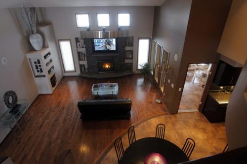 HOMES - 1307 Charleswood Road. View from the top of the staircase looking down on the main living room. REPORTER: Todd Lewys  February 6, 2012 BORIS MINKEVICH / WINNIPEG FREE PRESS