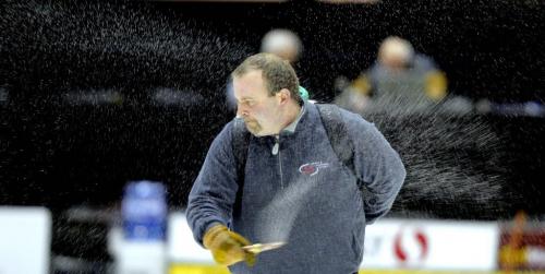 Safeway Select curling in Dauphin, Manitoba. Ice tech Greg Ewasko in photo pebbling. This is done before every game. Greg is one of the two people in charge of maintaining the ice in the curling event that started this morning. February 8, 2012 BORIS MINKEVICH / WINNIPEG FREE PRESS