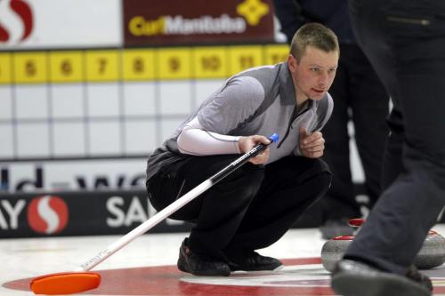 2012 Safeway Championship. Manitoba Men's Curling Championship in Dauphin, Manitoba. Daley Peters, in grey, in their first match Wednesday afternoon. February 8, 2012 BORIS MINKEVICH / WINNIPEG FREE PRESS