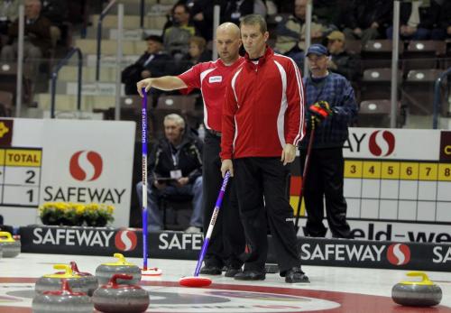 2012 Safeway Championship. Manitoba Men's Curling Championship in Dauphin, Manitoba. Jeff Stoughton, right, and teammate Jon Mead, left, curling Thursday afternoon. February 9, 2012 BORIS MINKEVICH / WINNIPEG FREE PRESS