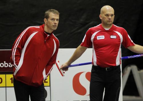 2012 Safeway Championship. Manitoba Men's Curling Championship in Dauphin, Manitoba. Jeff Stoughton, left, and teammate Jon Mead, right, curling Thursday afternoon. February 9, 2012 BORIS MINKEVICH / WINNIPEG FREE PRESS