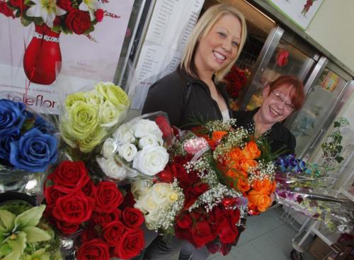 Jemini Beroud and her mother Dale Beroud pose for a photo with some flowers that their flower shop is selling for Valentines Day. Their shop, Kings Florist, has been around for 75 years and they have run it for 25 years on Portage Avenue. February 13, 2012  BORIS MINKEVICH / WINNIPEG FREE PRESS
