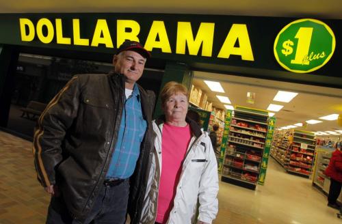 John and Gerri Chartrand pose for a photo in front of the Dollarama in Northgate Mall. February 15, 2012  BORIS MINKEVICH / WINNIPEG FREE PRESS