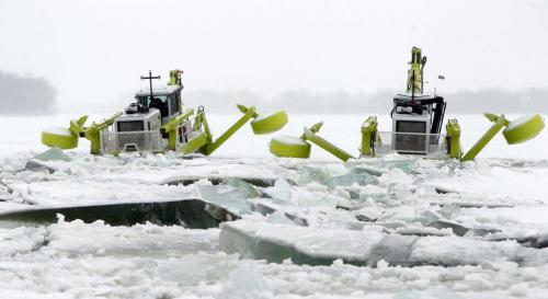 The province's new Amphibex AE 400 starts breaking ice north of Selkirk, Manitoba on the Red River.  February 21, 2012  BORIS MINKEVICH / WINNIPEG FREE PRESS