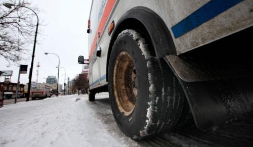 See story re improper tires on ambulances....this one was parked at Lions place on Portage ave Tuesday afternoon. February 21, 2012 - (Phil Hossack / Winnipeg Free Press