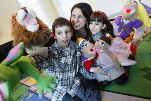 February 27, 2012 - 120227  -  Demetra Hajidiacos, with her children Peter (7) and Anna (5), runs a program at MTYP for autistic children is photographed in her home Monday February 27, 2012.    John Woods / Winnipeg Free Press