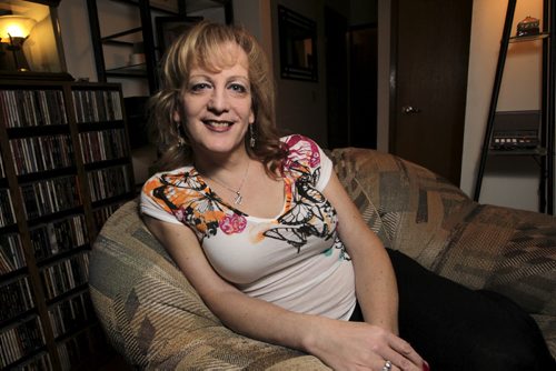 Relaxing on her couch at home Shandi has recently returned from Montreal where she underwent gender re-assignment surgery. See Carolin Vesely story for Sex in Our City feature 120225 - Tuesday, February 28, 2012 -  (MIKE DEAL / WINNIPEG FREE PRESS)