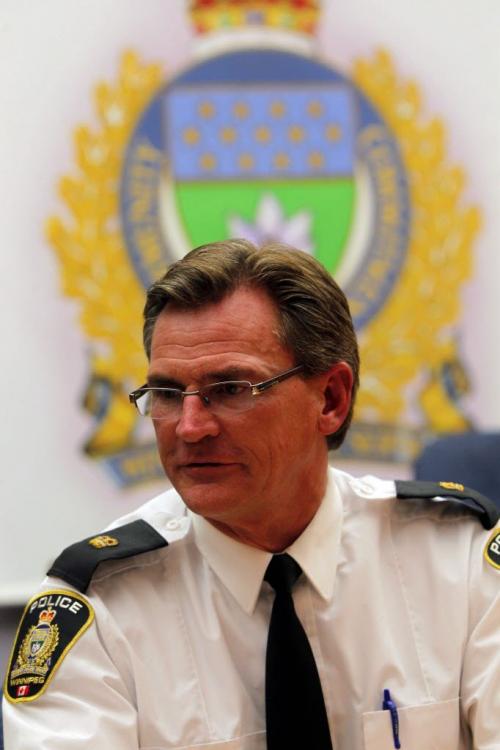 Insp. Jim Poole of WPS poses for some photos at PSB. February 28, 2012  BORIS MINKEVICH / WINNIPEG FREE PRESS