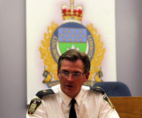 Insp. Jim Poole of WPS poses for some photos at PSB. February 28, 2012  BORIS MINKEVICH / WINNIPEG FREE PRESS
