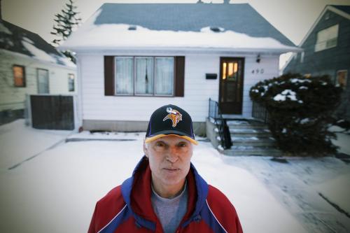 February 28, 2012 - 120228  -  Lee Benoit is photographed in front of his home after talking about today's city budget announcement and the increase in property taxes Tuesday February 28, 2012.    John Woods / Winnipeg Free Press